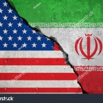 stock-photo-iranian-flag-on-broken-wall-and-half-usa-united-states-of-america-flag-crisis-trump-president-and-570899827 - 010518